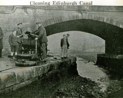 003 LUCS H0014 Cleaning canal at bridge 1